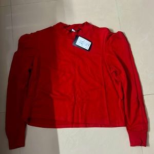 I am selling a top with full sleeves new with tag and is in red colour